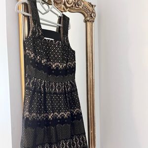 Such a cute dress. Lace on top, fitted on the top and flowy on the bottom